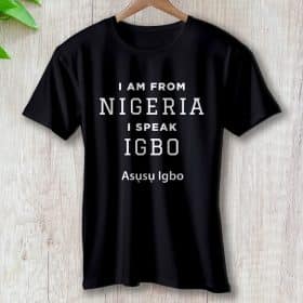 Person wearing Igbo heritage apparel featuring Igbo language text and cultural designs