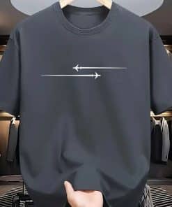 Traveler wearing a comfortable travel t shirt while exploring a scenic destination