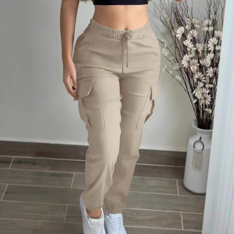 Woman wearing cargo trousers women style with a casual top while traveling in a city.