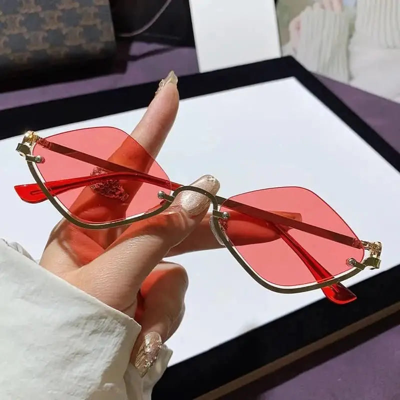 cat-eye-sunglasses-with-gold-metal-frame-around-the-world-in-a-rush-5658592