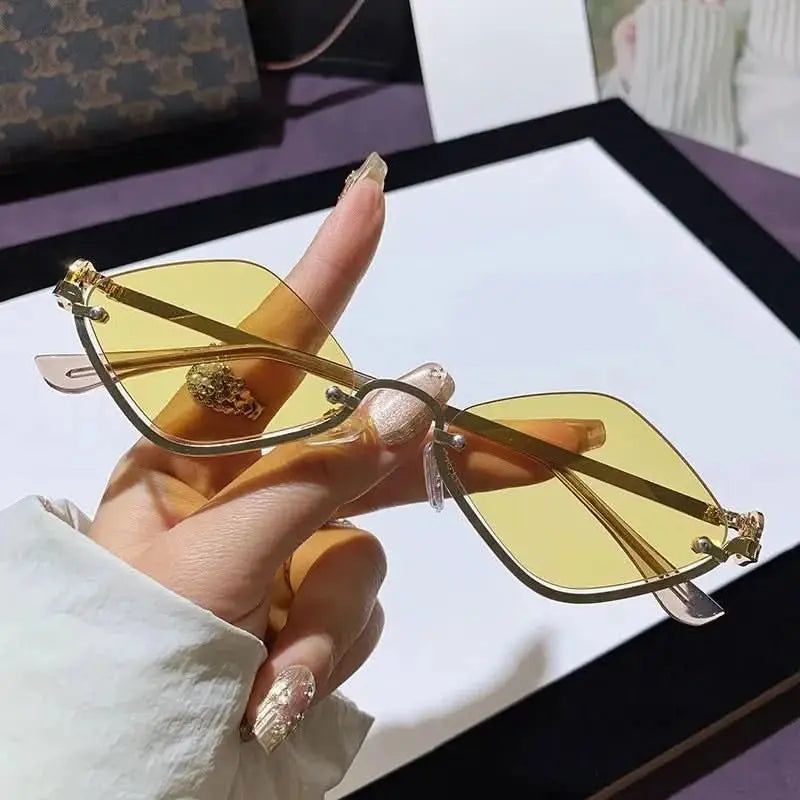 cat-eye-sunglasses-with-gold-metal-frame-around-the-world-in-a-rush-7444034