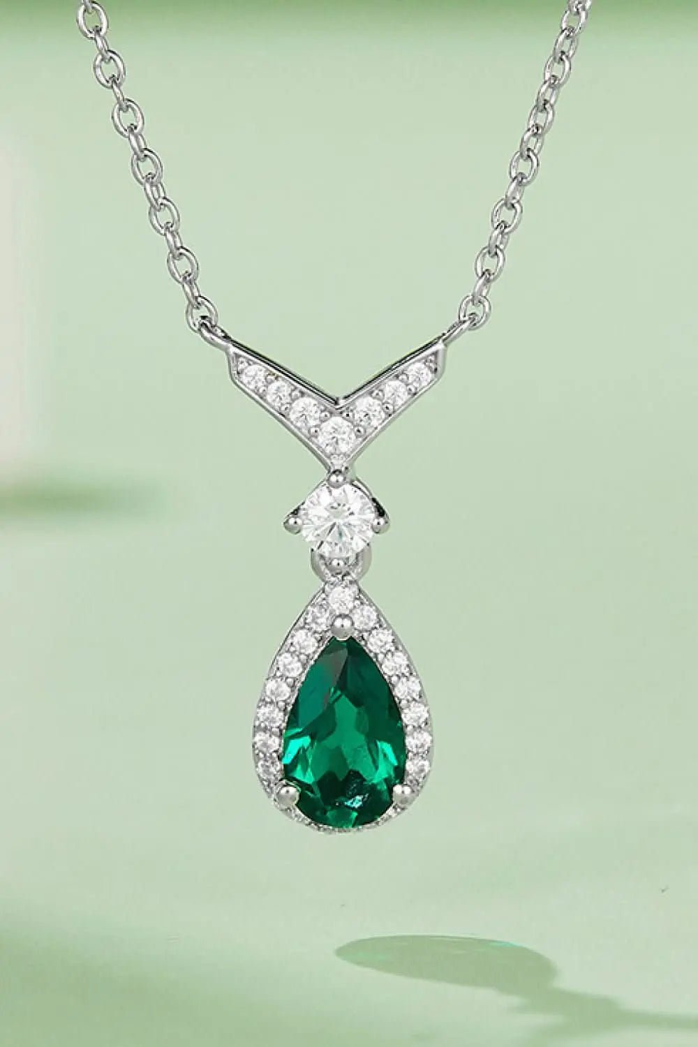lab-grown-emerald-teardrop-necklace-around-the-world-in-a-rush-3829255