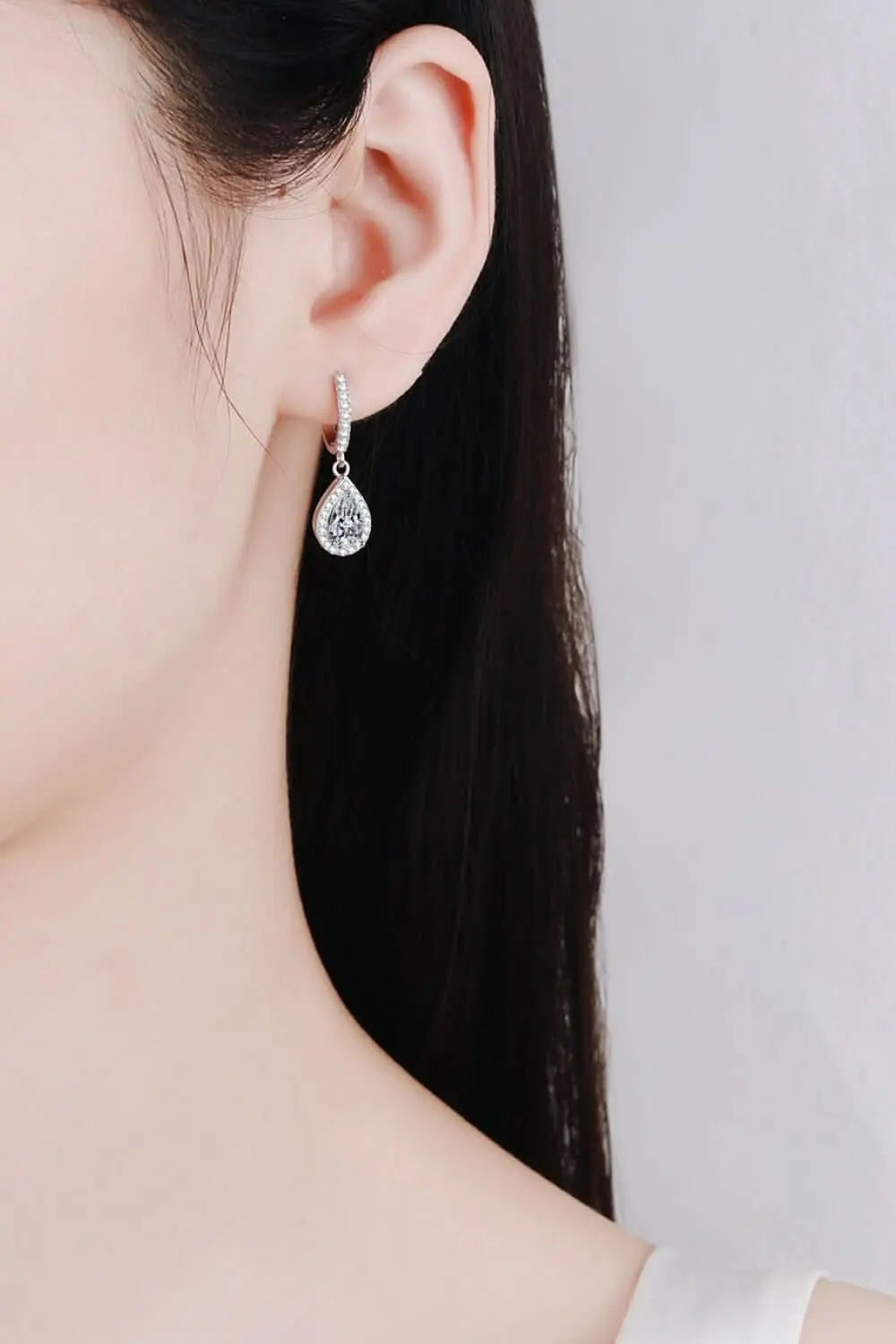 moissanite-teardrop-earrings-around-the-world-in-a-rush-1294898