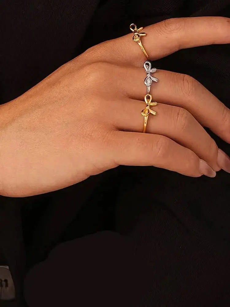 stainless-steel-bow-ring-around-the-world-in-a-rush-7224621